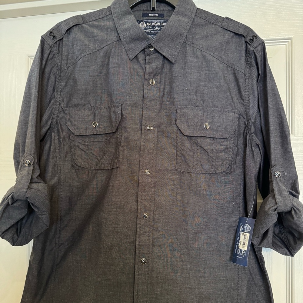 Brand New with tags!!!  American Rag- dark blue, light weight denim style Sz M